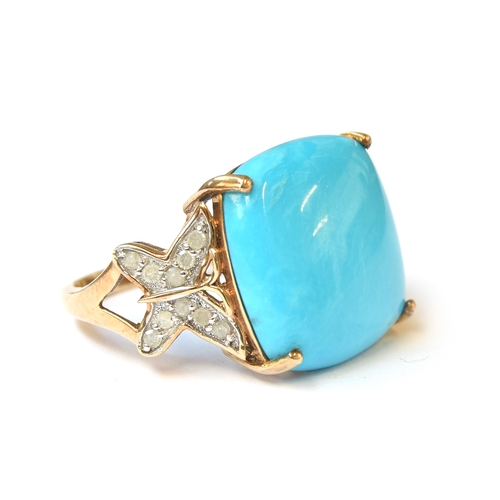 53 - A 9ct gold ring set with a a cushion cabochon of Sleeping Beauty turquoise, the butterfly shaped sho... 