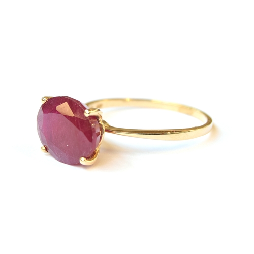 6 - A 9ct gold ring set with a Thai ruby, 6.15cts, size S, 3.1g