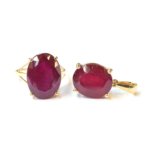 7 - A 10ct gold ring set with a large ruby, the Malagasy ruby 13.6cts, size Q, 4.6g; together with a mat... 