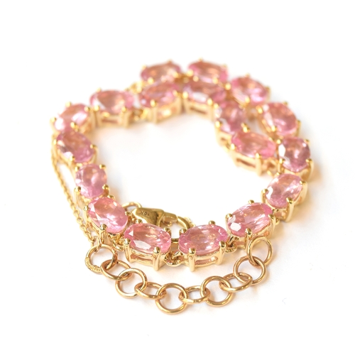 8 - A 10ct gold bracelet set with pink spinels, the Mozambique spinels totalling 8.44cts, 7.6g