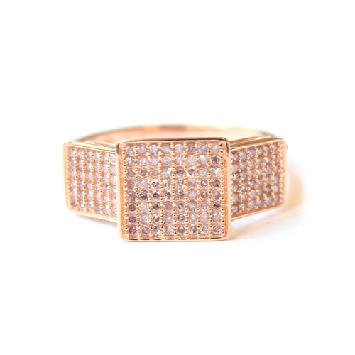 57 - A 9ct rose gold panel ring set with pink diamonds, the diamonds totalling 0.5cts, size P 1/2, 2.3g