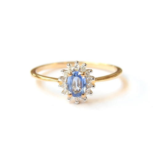 59 - A 9ct gold sapphire and white zircon cluster ring, the Ceylon sapphire 0.6cts, size S, 1.9g