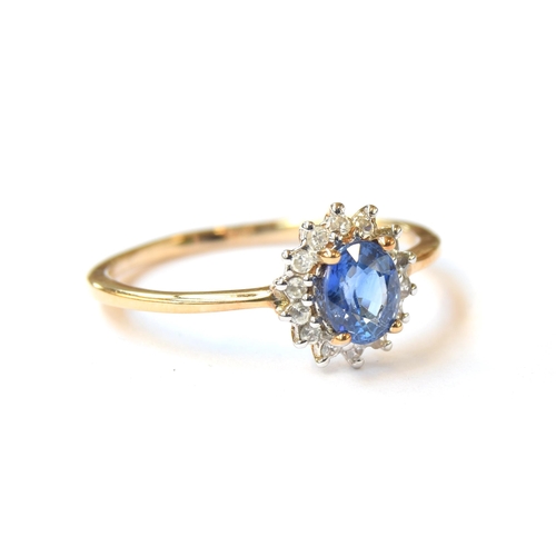 60 - A 9ct gold sapphire and white zircon cluster ring, the Ceylon sapphire 0.8cts, size S, 2.1g