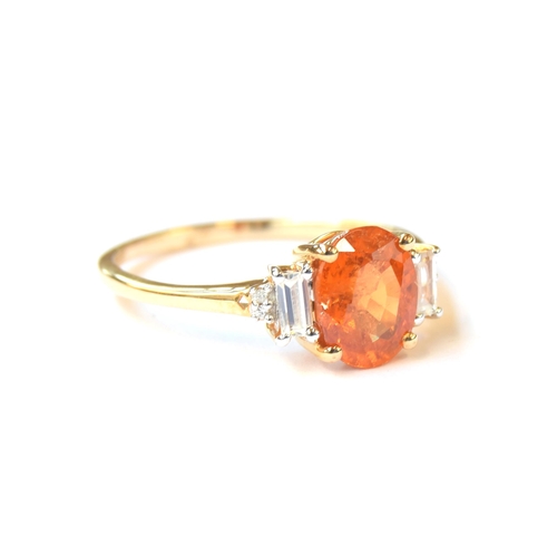 62 - A 9ct gold mandarin garnet and white zircon ring, the garnet 2.7cts, size S, 2.4g