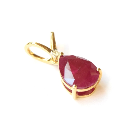 68 - A 9ct gold ruby and diamond pendant, the pear shaped Burmese ruby 3.2cts and 11x8mm, 1.4g