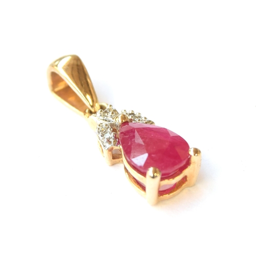 69 - A 10ct gold pendant set with a ruby and diamonds, the Montepuez ruby 1.3cts and 8x6mm, 1.3g