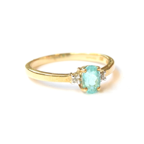 71 - A 9ct gold ring set with a paraiba tourmaline and white sapphires, the Brazilian tourmaline 0.5cts, ... 