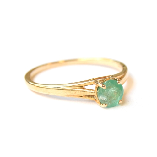 78 - A 9ct gold and emerald solitaire ring, the Zambian emerald 0.6cts, size R 1/2, 1.7g