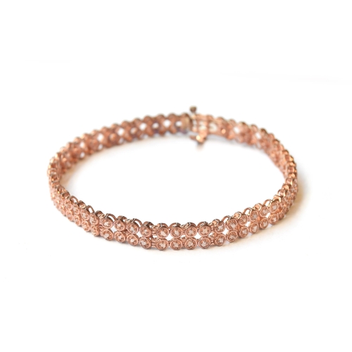 91 - A sterling silver with rose gold vermeil bracelet set with natural pink uncut diamonds, the 116 diam... 