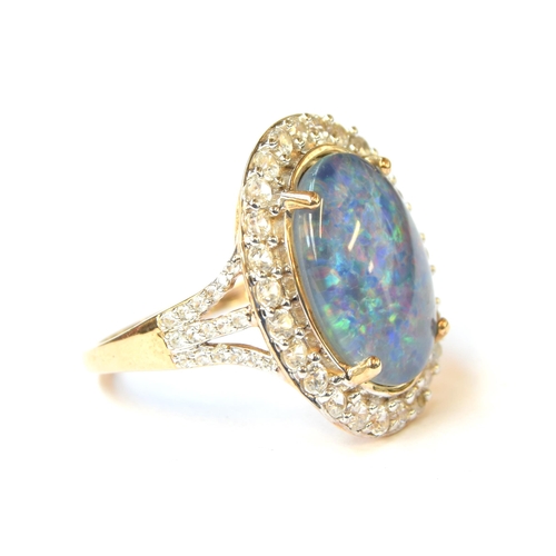 96 - A 9ct gold, opal triplet and white zircon ring, the opal triplet 16x12mm, size P 1/2, 5.2g