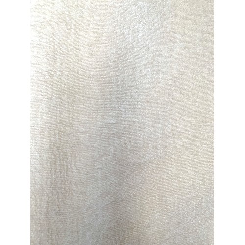 636 - A pair of cream wool and silk blend curtains, lined, each 151x278cm