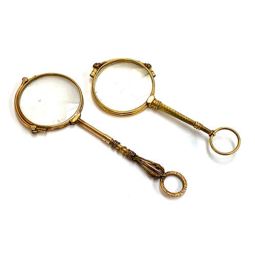 125 - Two Victorian gilt metal lorgnettes, one with engine turned handle