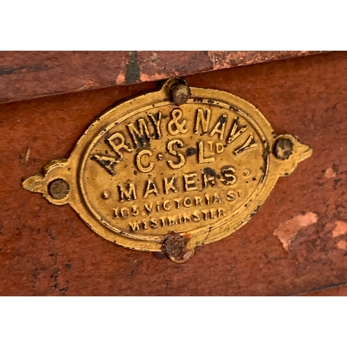 656 - An early 20th century Army & Navy Makers Westminster red travel trunk with leather bracing and handl... 