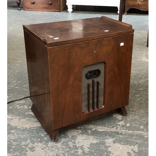 643 - A small Decca radiogram, with Garrard 2025TC turntable