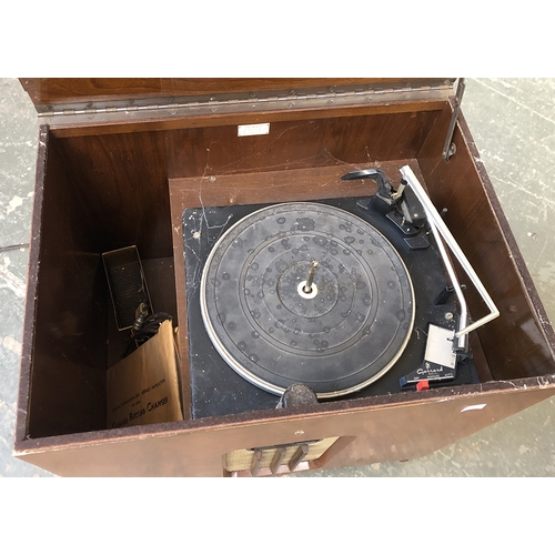 643 - A small Decca radiogram, with Garrard 2025TC turntable