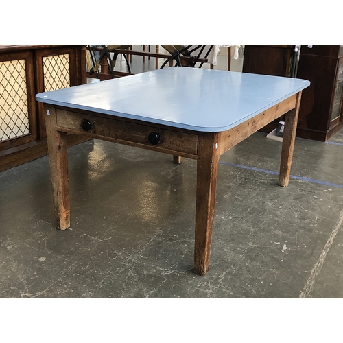 661 - A formica topped pine kitchen table, 153x105x73cmH