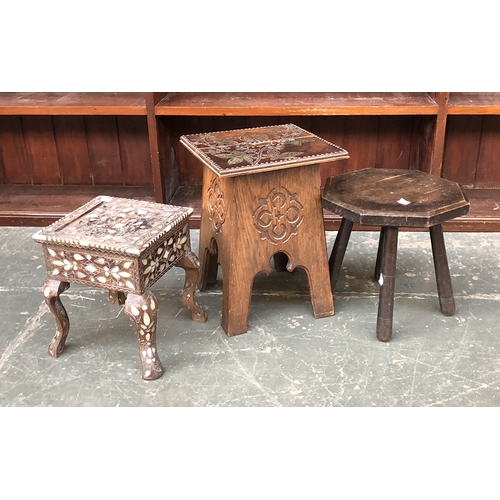 675 - A Moorish style occasional table/stool with mother of pearl inlay, 29cmH; a further occasional table... 