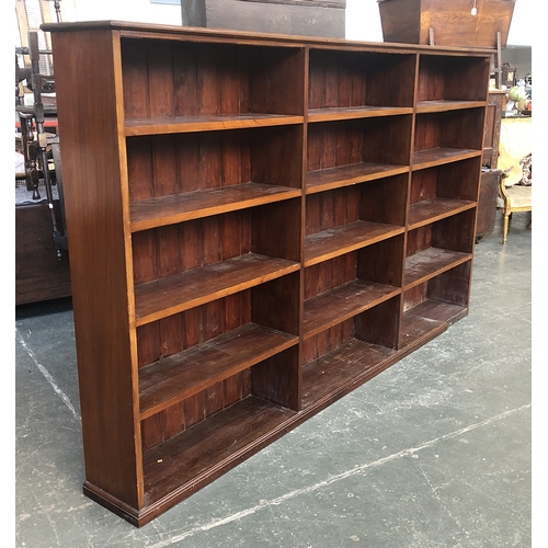 690 - An impressive mahogany and pine bookcase three sections each of five shelves, 269x33x157cmH