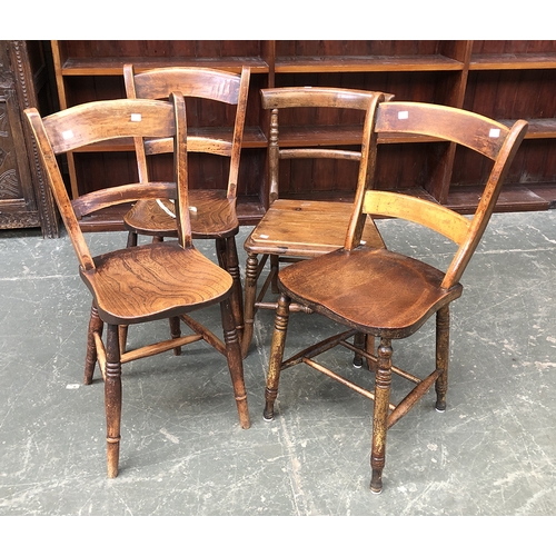 698 - Three beech and elm scrollback Windsor side chairs; together with a further side chair