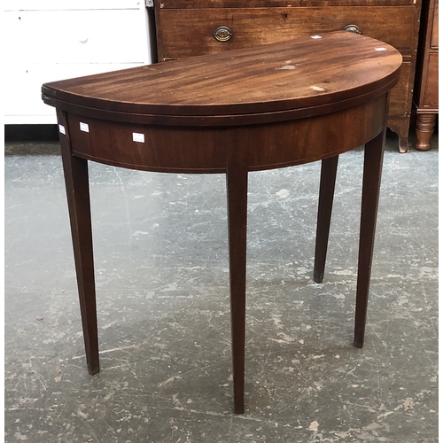 701 - A George III demilune mahogany gateleg tea table with square tapered legs, 86x74cmH