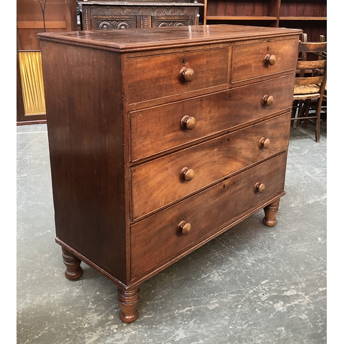 716 - A 19th century mahogany chest of two short over three long drawers, on tall turned feet, 116x50x108c... 