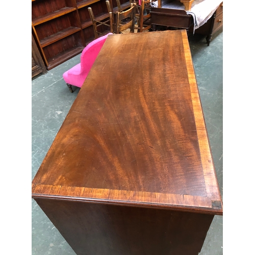 716 - A 19th century mahogany chest of two short over three long drawers, on tall turned feet, 116x50x108c... 