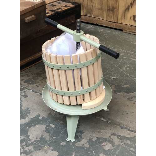 720 - A table top beech and steel apple press