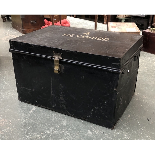 736 - A canvas and wood banded travel trunk; together with two large metal travel trunks, the larger 90cmW