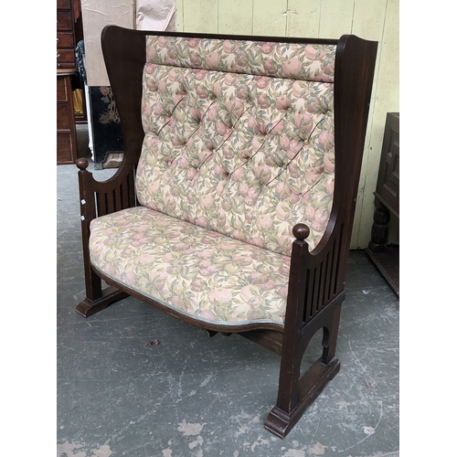 744 - An upholstered wingback settle