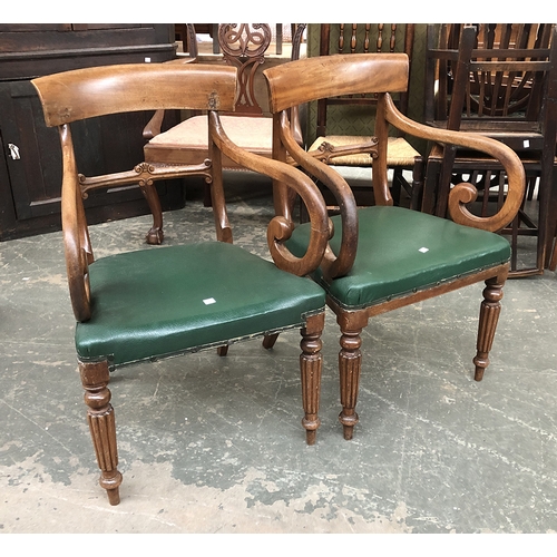 765 - A pair of 19th century mahogany open armchairs, green stuffover seats, curved rail over scrolling ar... 