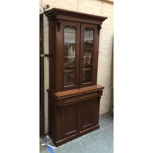 811 - A small Victorian mahogany library bookcase, glazed top, with adjustable shelves, cupboards below, 9... 