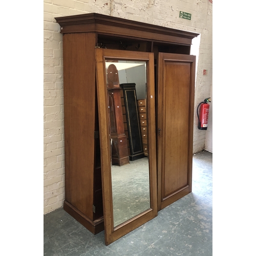 816 - A smart 19th century gents compactum wardrobe, two doors,  opening to an arrangement of slides and d... 