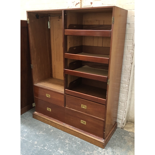 816 - A smart 19th century gents compactum wardrobe, two doors,  opening to an arrangement of slides and d... 