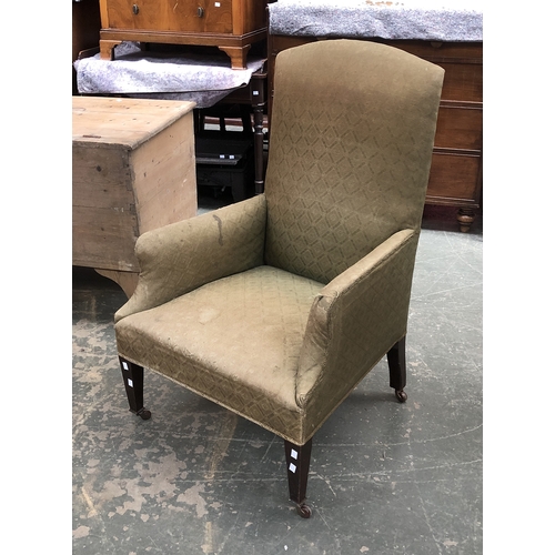 728 - A neat 19th century armchair, with high back, on square tapered legs and casters