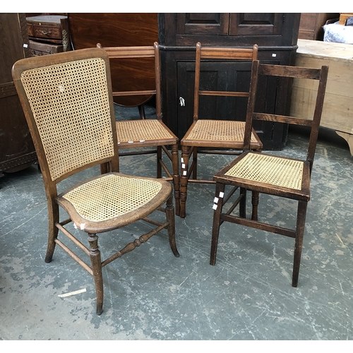 729 - A pair of Edwardian caned side chairs, together with two further caned side chairs (4)