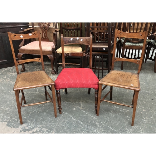 754 - A pair of Arts and Crafts side chairs; together with a further chair