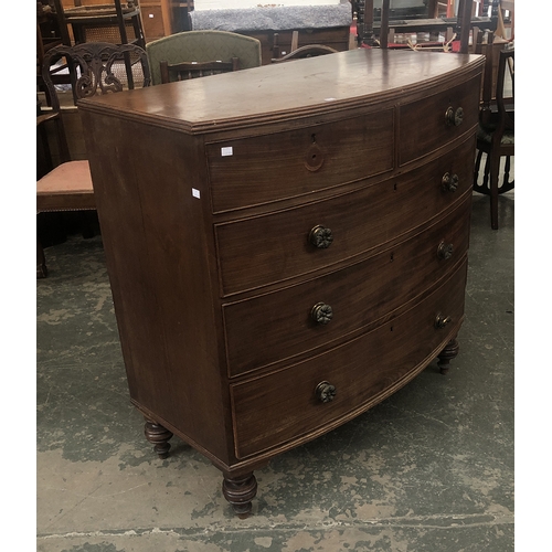 767 - A Regency mahogany bowfront chest of drawers with gilt metal knobs and turned feet, 107x55x108cmH