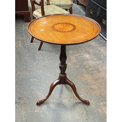 780 - A 19th century tripod table, dished tilt top, with central fan patera, on turned column and tripod c... 