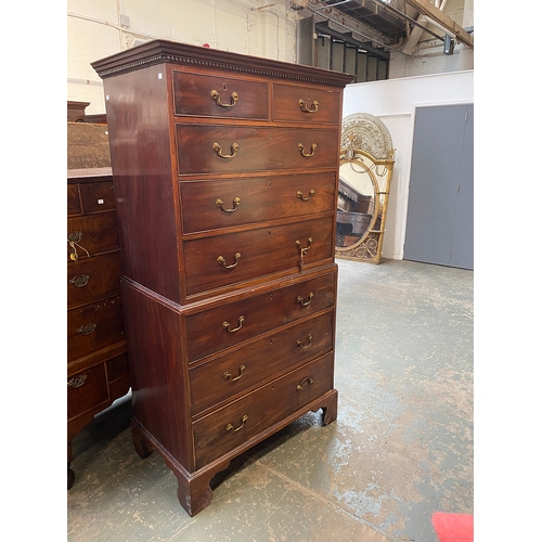 783 - A George III mahogany chest on chest, the top with dentil cornice, over two short and three long dra... 