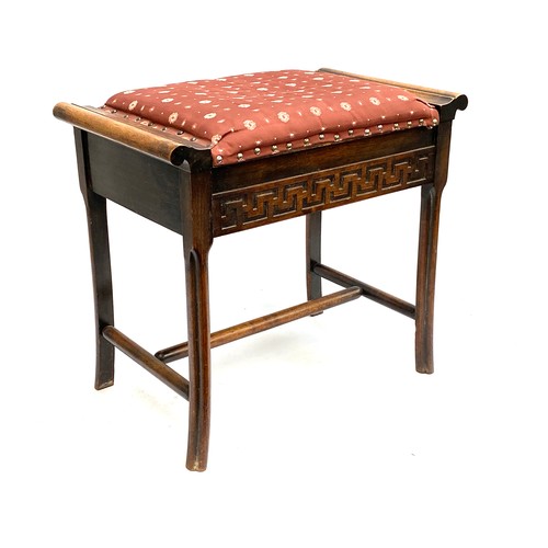 630 - A hardwood piano stool with chinoiserie style legs and frieze, 58cmW