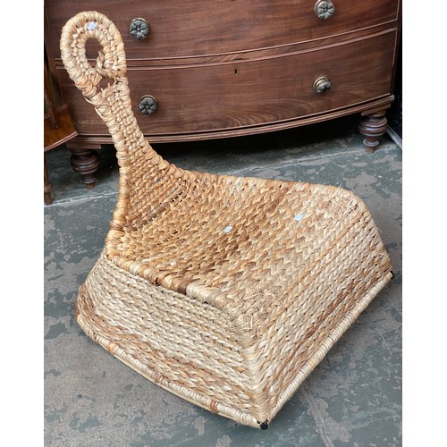 786 - A rattan rocking chair