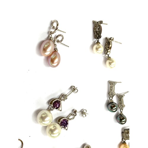 49 - A lot of 10 pairs of earrings, to include 925 silver and cultured pearl drop earrings