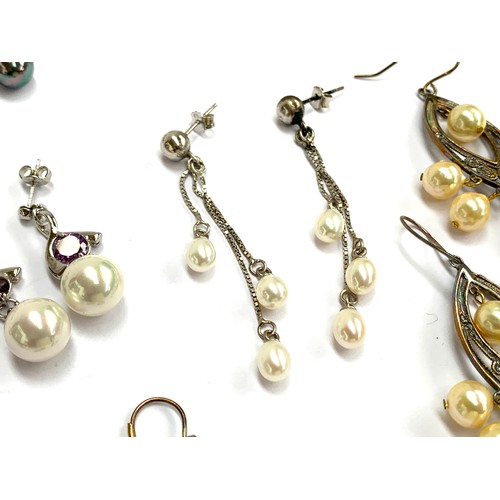 49 - A lot of 10 pairs of earrings, to include 925 silver and cultured pearl drop earrings