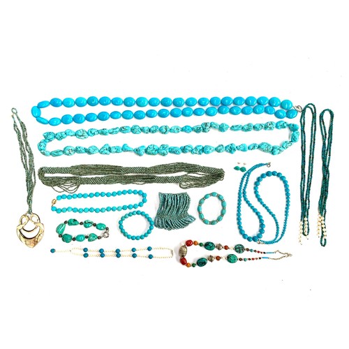 44 - A quantity of turquoise coloured beaded jewellery to include heavy dyed howlite tumbled stone neckla... 