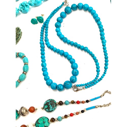 44 - A quantity of turquoise coloured beaded jewellery to include heavy dyed howlite tumbled stone neckla... 