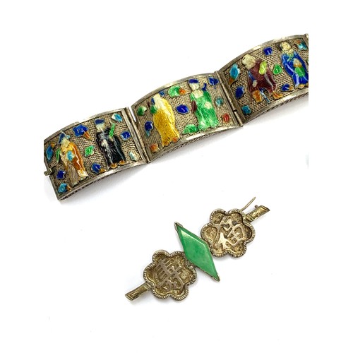 56 - An unusual Chinese export silver and enamel panel bracelet (af), in need of repair, 18cmL; together ... 