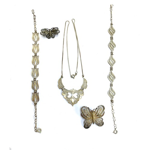 62 - A quantity of silver filigree jewellery to include butterfly brooches, necklace and bracelets