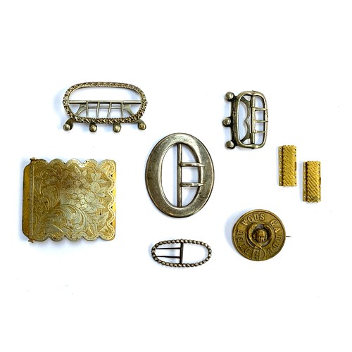 64 - A quantity of buckles and clasps to include a pair of Georgian pinchbeck clasps; smart silver buckle... 