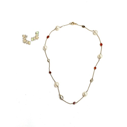 70 - A silver station chain interspersed with cultured pearls and agate, fastening with a 9ct gold clasp,... 