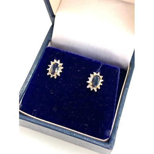 78 - A pair of 9ct gold, sapphire and diamond cluster stud earrings, 0.7cmL, 1.1g